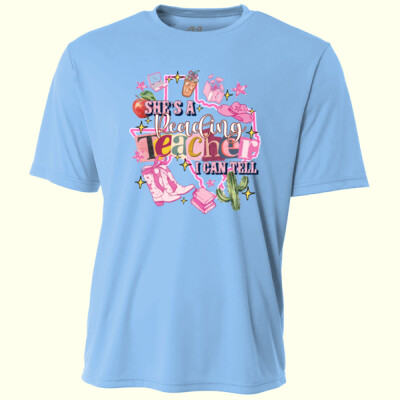 She's a Reading Teacher 83-100 - Adult Cooling Performance Short Sleeve Tee Thumbnail