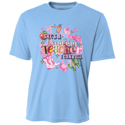 She's a Reading Teacher 83-100 - Adult Cooling Performance Short Sleeve Tee Thumbnail
